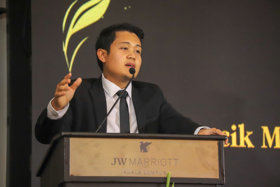 Jeeb speaking at a conference in Kuala Lumpur